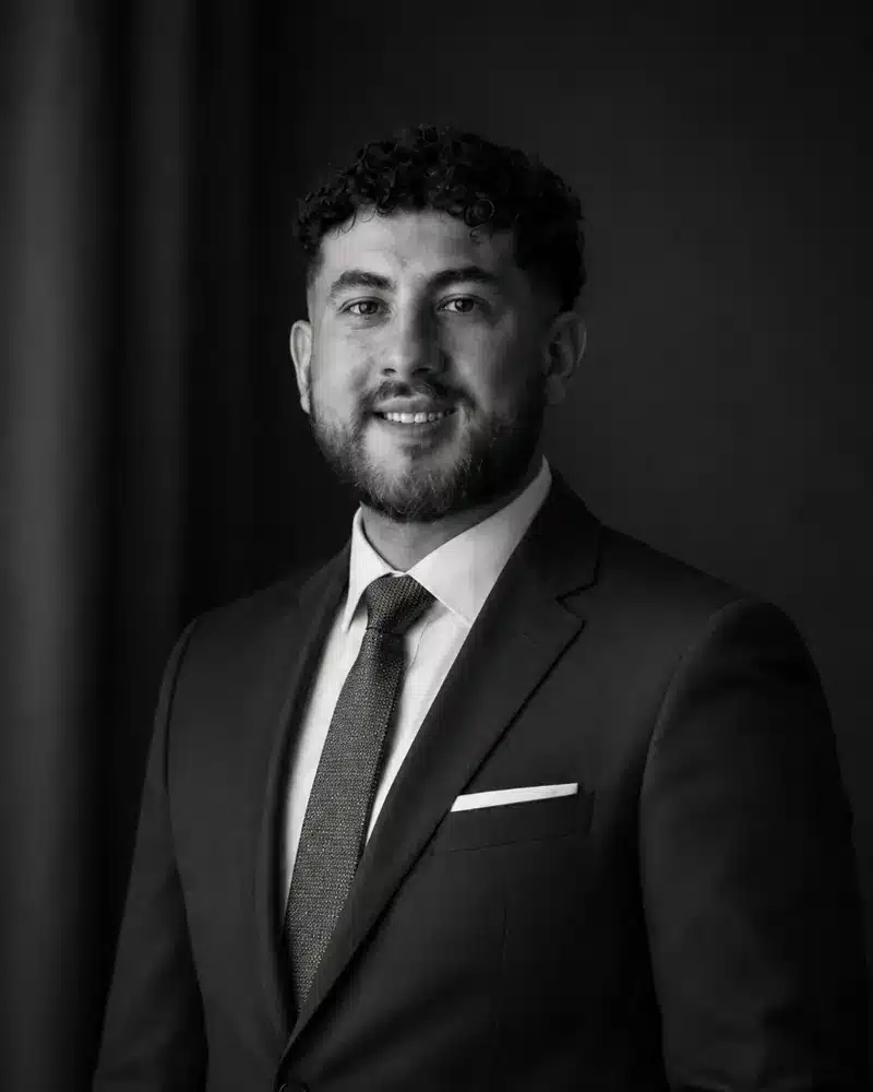 black and white image of mark in a suit